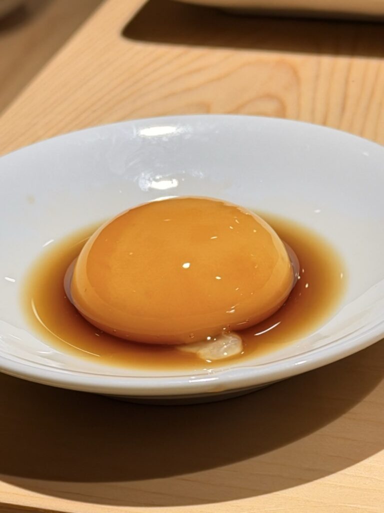 タレに落とした卵黄